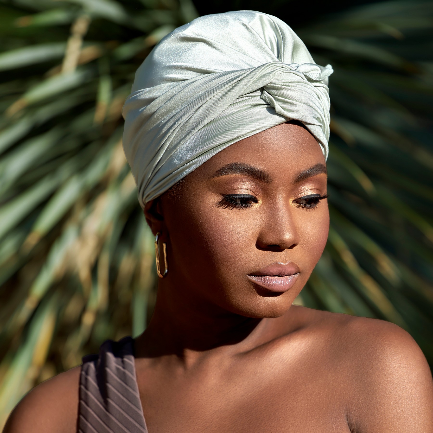 A beautiful black girl wearing stylish turban